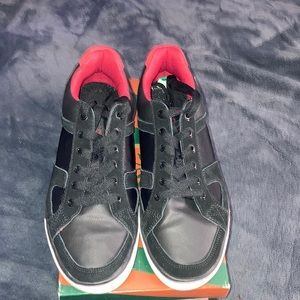 I am selling a pre-owned black/red penguin shoes